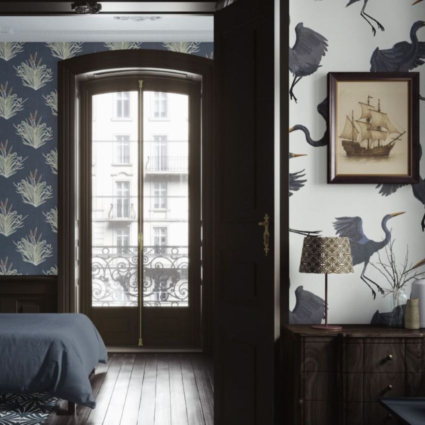 Classical apartment wallpaper mockup featuring a bedroom with dark wood furniture, patterned walls, and a large window.