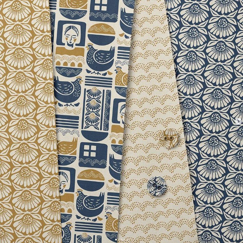 Cotton fabric sample mockup featuring four patterned fabric swatches in blue, beige, and gold with floral and hen motifs.