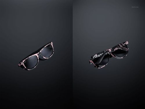 PSD mockup of custom printed sunglasses with black lenses and pink marbled frames, presented on a dark surface.