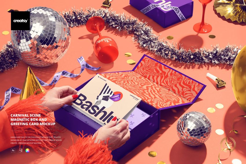 Open magnetic box mockup with colorful interior, disco balls, confetti, and party accessories on an orange background.