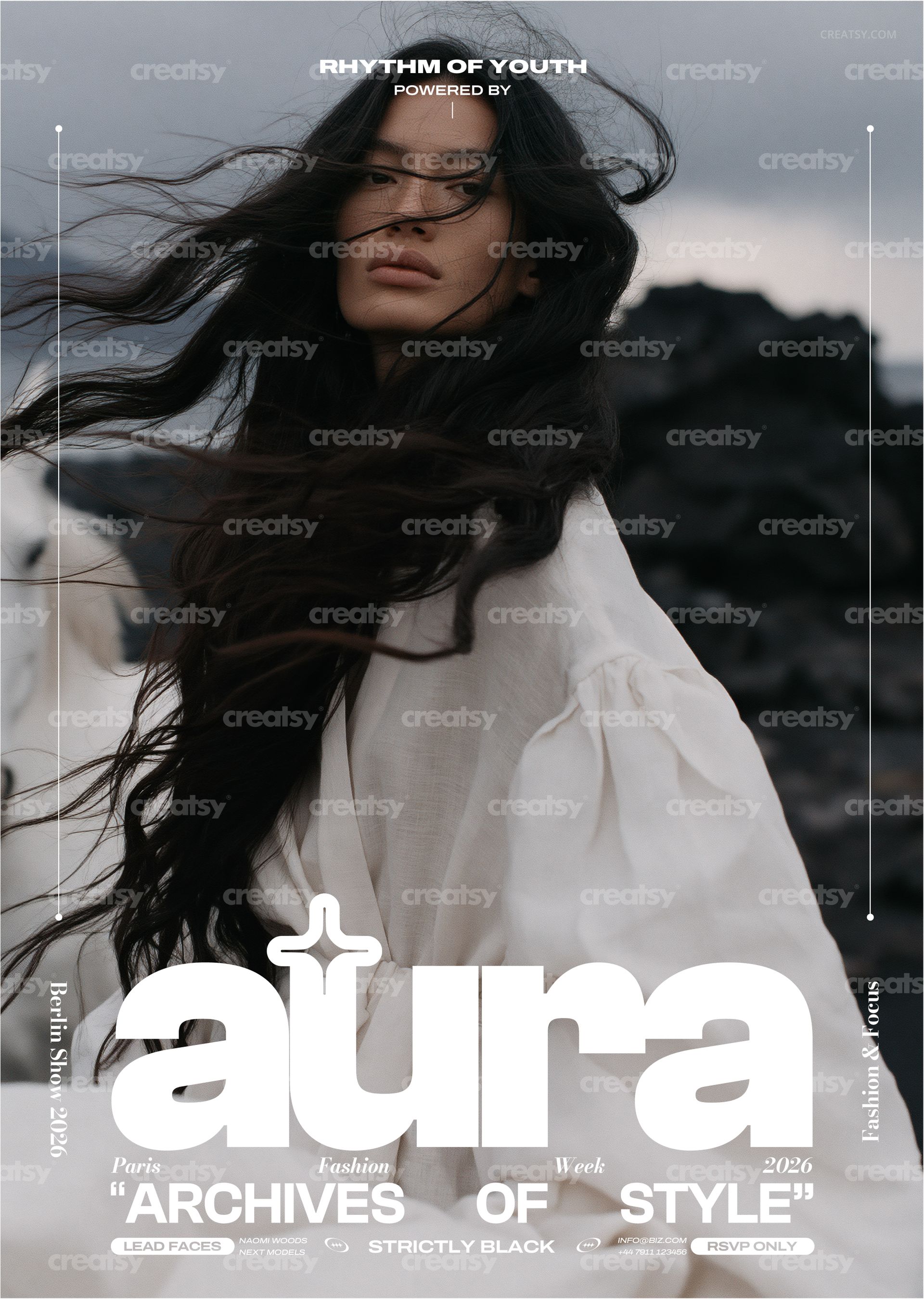 Front view of a poster mockup featuring a woman with long dark hair in a light linen outfit against a rocky backdrop.
