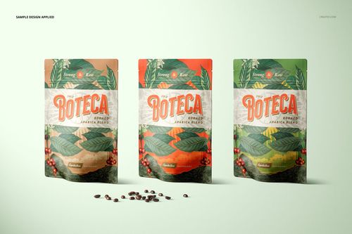 Three upright doypack bag pouches with botanical and coffee motifs, shown in a PSD mockup scene with scattered beans.