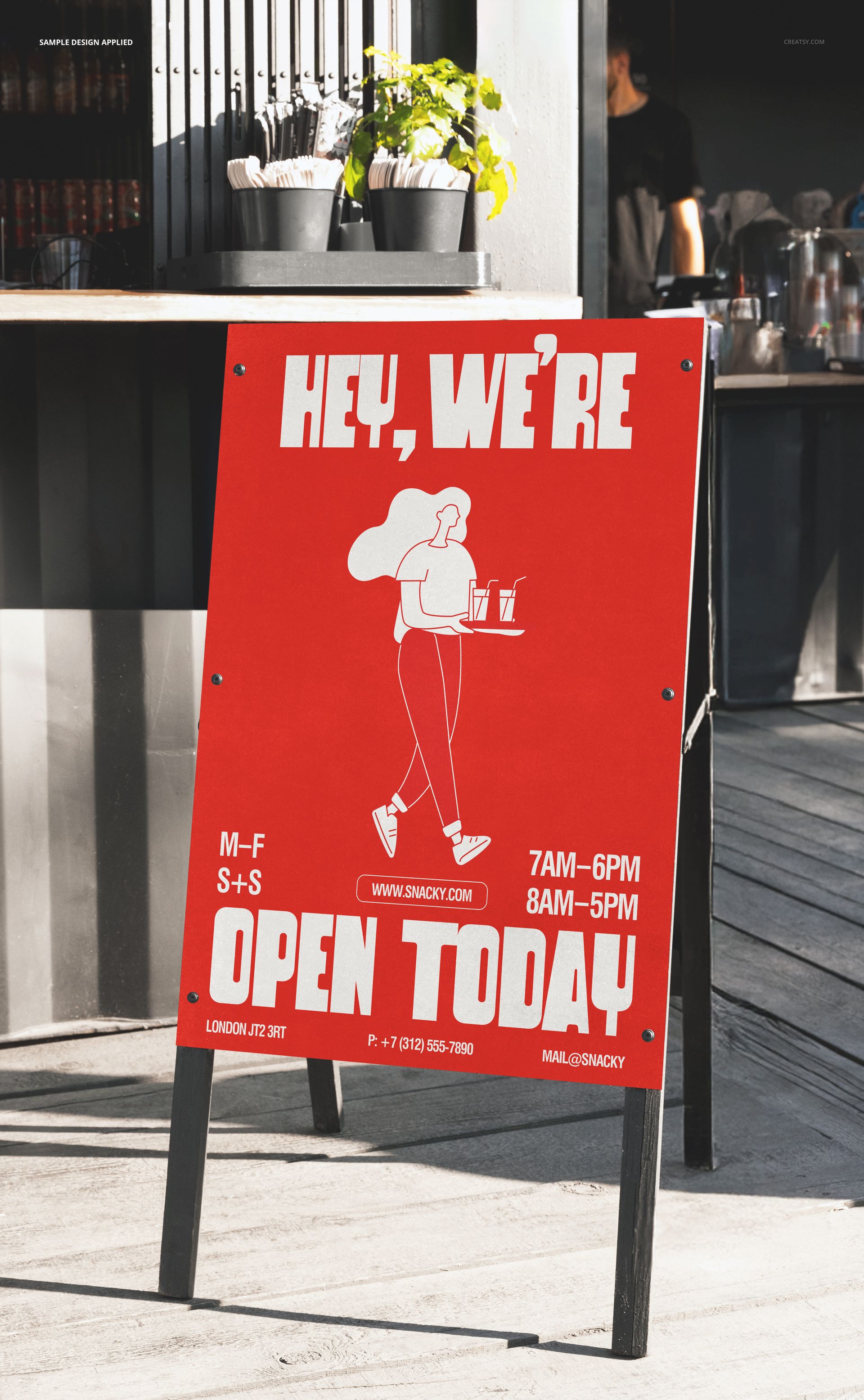 Outdoor advertising A-stand mockup with a red sign board, white text, and illustrated figure, placed on a wooden floor.