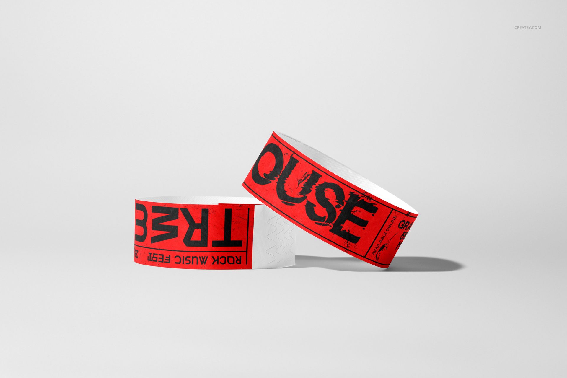 Paper wristband PSD mockup featuring two wristbands with red and black graphics, set against a neutral background.
