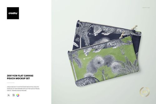 Two flat canvas pouches with botanical and animal patterns, one in navy blue and one in green, displayed at an angle.