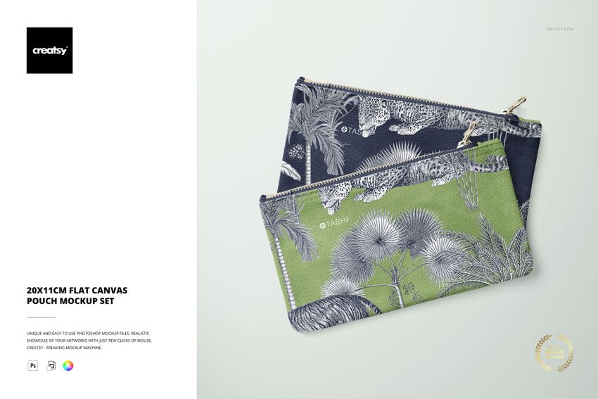 Two flat canvas pouches with botanical and animal patterns, one in navy blue and one in green, displayed at an angle.