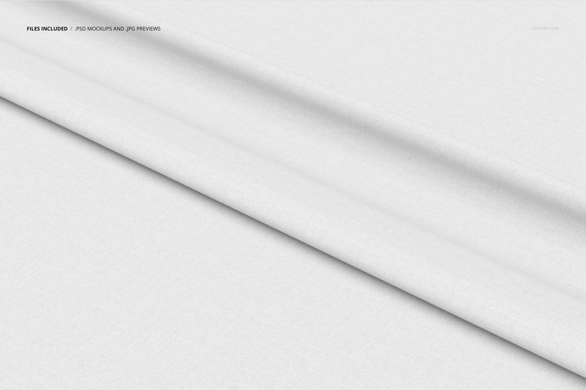 Lying fabric mockup featuring white textile with subtle texture, shown from a top view with gentle folds.