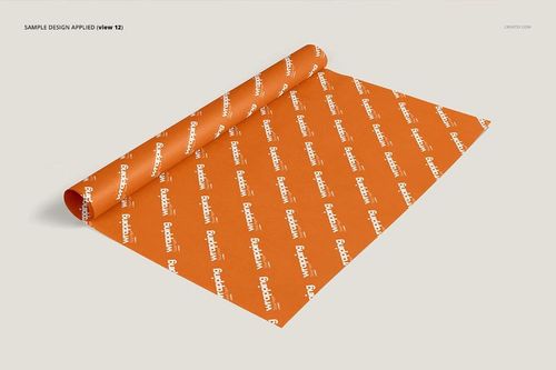 Orange wrapping tissue paper mockup displayed on a light background, shown from a top angled perspective.