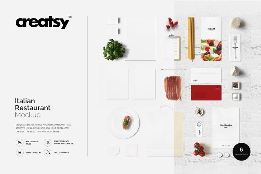 Italian restaurant stationery mockup with menus, envelopes, and business cards arranged on a white table with food props.