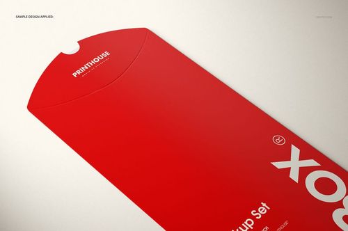 Rectangular pillow box mockup with a bright red surface, white lettering, and a curved notch, shown in perspective view.