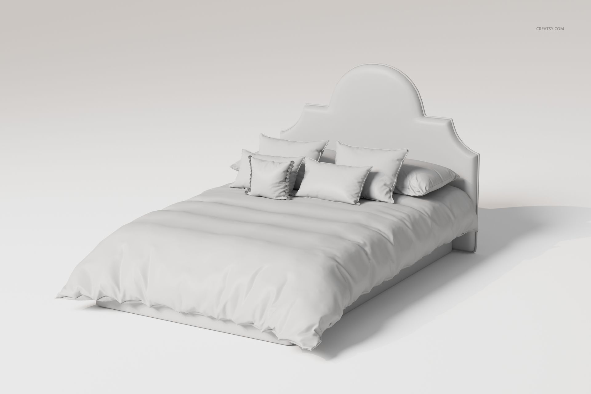 Upholstered bed with arched headboard shown from a front angle, featuring multiple pillows and a duvet in a neutral setting.