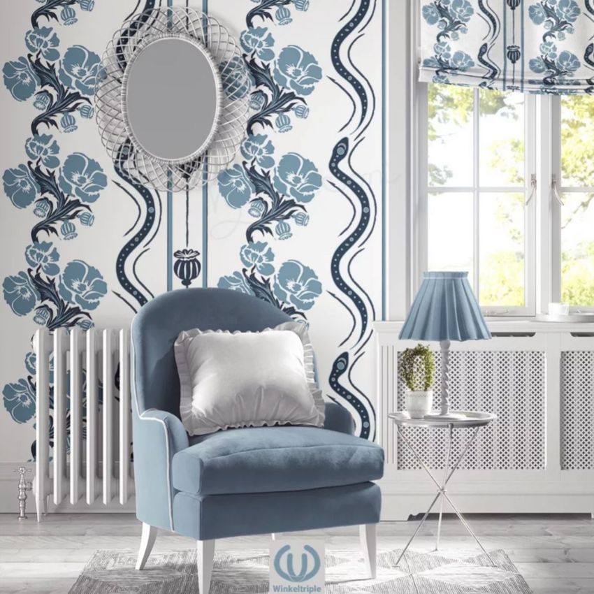 Upholstered armchair mockup in a cottagecore scene with blue and white floral wallpaper, a round mirror, and a small side table.