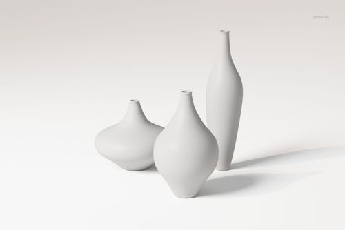 Three decorative vases of varying sizes and shapes in matte white, arranged on a plain light background, front view.