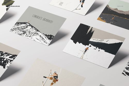 A2 cards mockup set featuring several illustrated greeting cards with winter sports designs, arranged on a light surface.