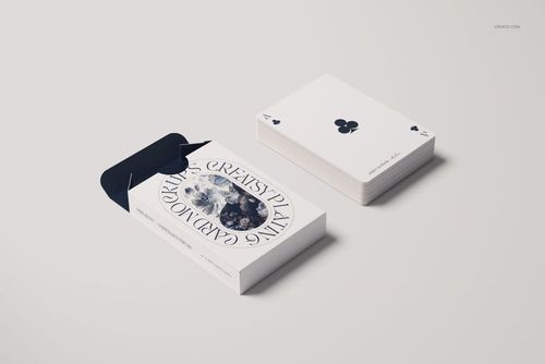 Playing cards mockup featuring a stack of cards and an open rectangular box on a light surface, front view.