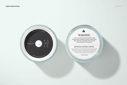Mockup of frosted glass candles viewed from above, featuring contrasting black and white circular labels.