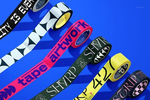 Assorted packaging tape mockup with geometric shapes and text, shown in a dynamic layout on a blue backdrop.