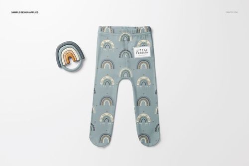 Mockup of baby leggings featuring a soft blue base and repeating rainbow design, shown next to a rainbow teether.