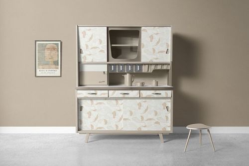 Kitchen cupboard mockup featuring a mid-century style cabinet with light patterned doors, set against a beige wall and gray floor.