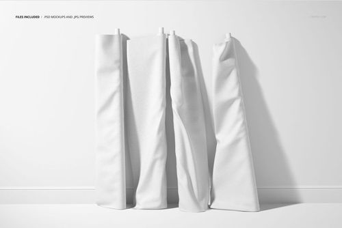 Four vertical fabric rolls in solid white, positioned side by side on a white floor and background in a mockup scene.