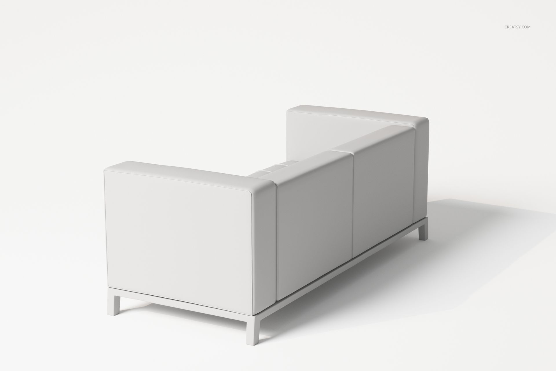 Modular sofa with a loft style design, shown from a rear angle, featuring clean white upholstery and minimal legs.