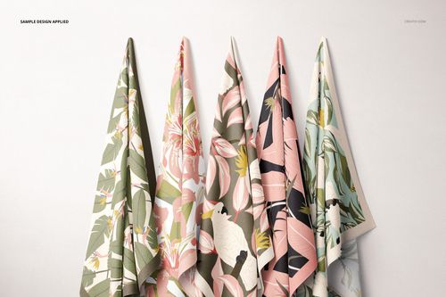 Hanging fabrics mockup set showing various textile designs with leaves, flowers, and birds in soft, muted shades.