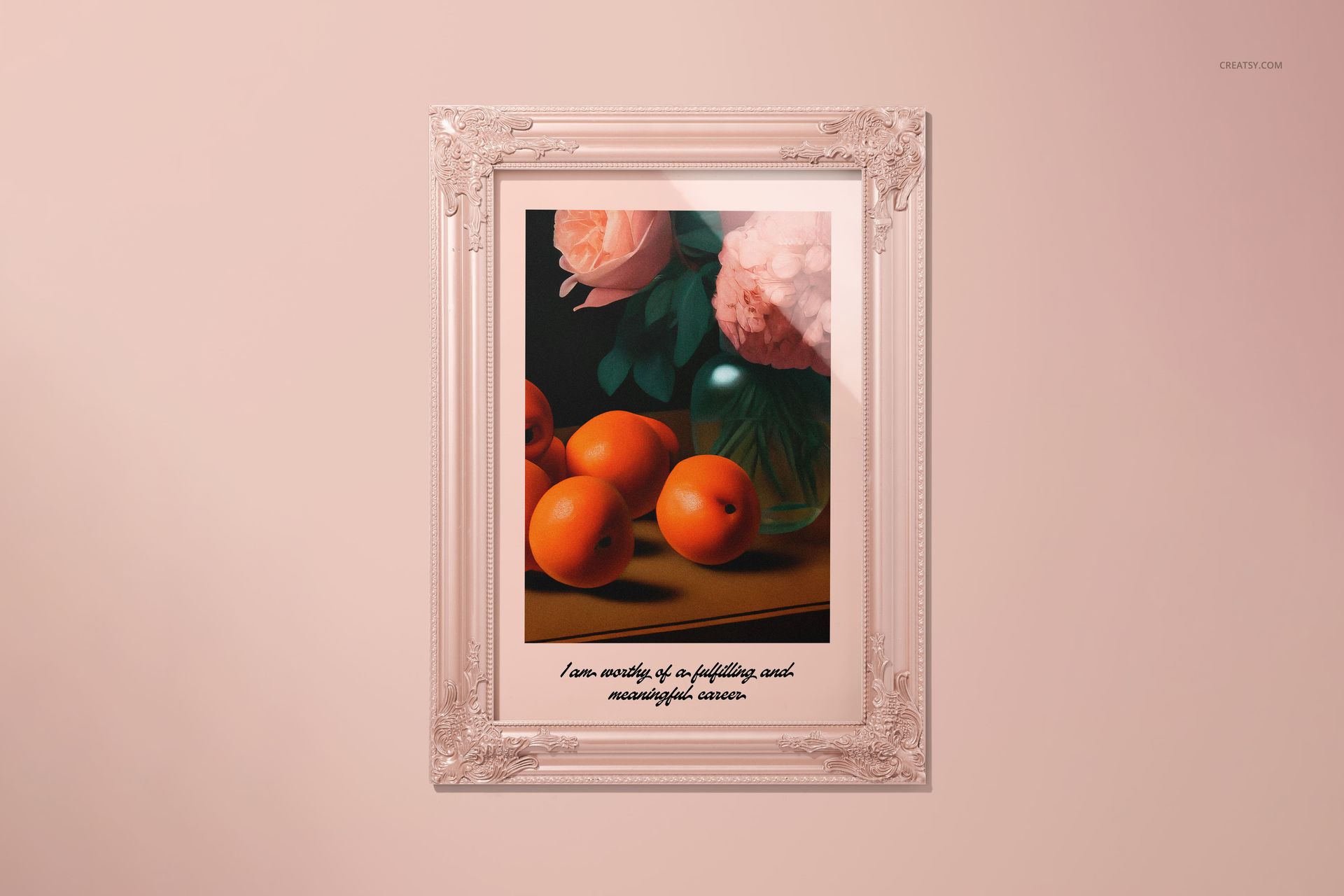 Framed glossy poster mockup featuring a still life of oranges, flowers, and a vase on a light pink wall.