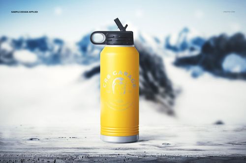 Front view of a yellow 32 oz. water bottle mockup with black top, placed on a snowy surface against a wintry background.