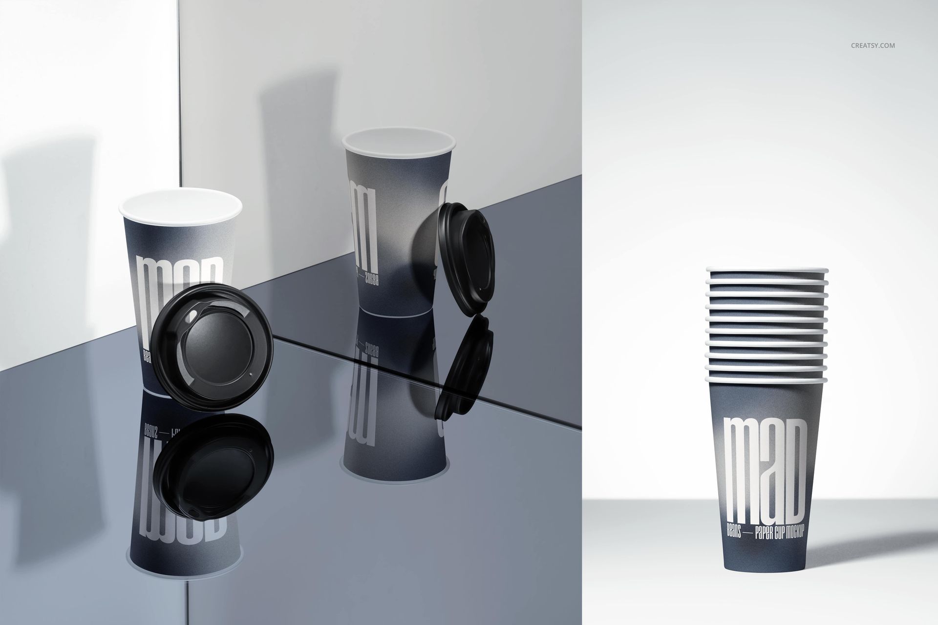 Paper cup PSD mockup set featuring three cups in black and white tones, with one lid placed beside the cups.