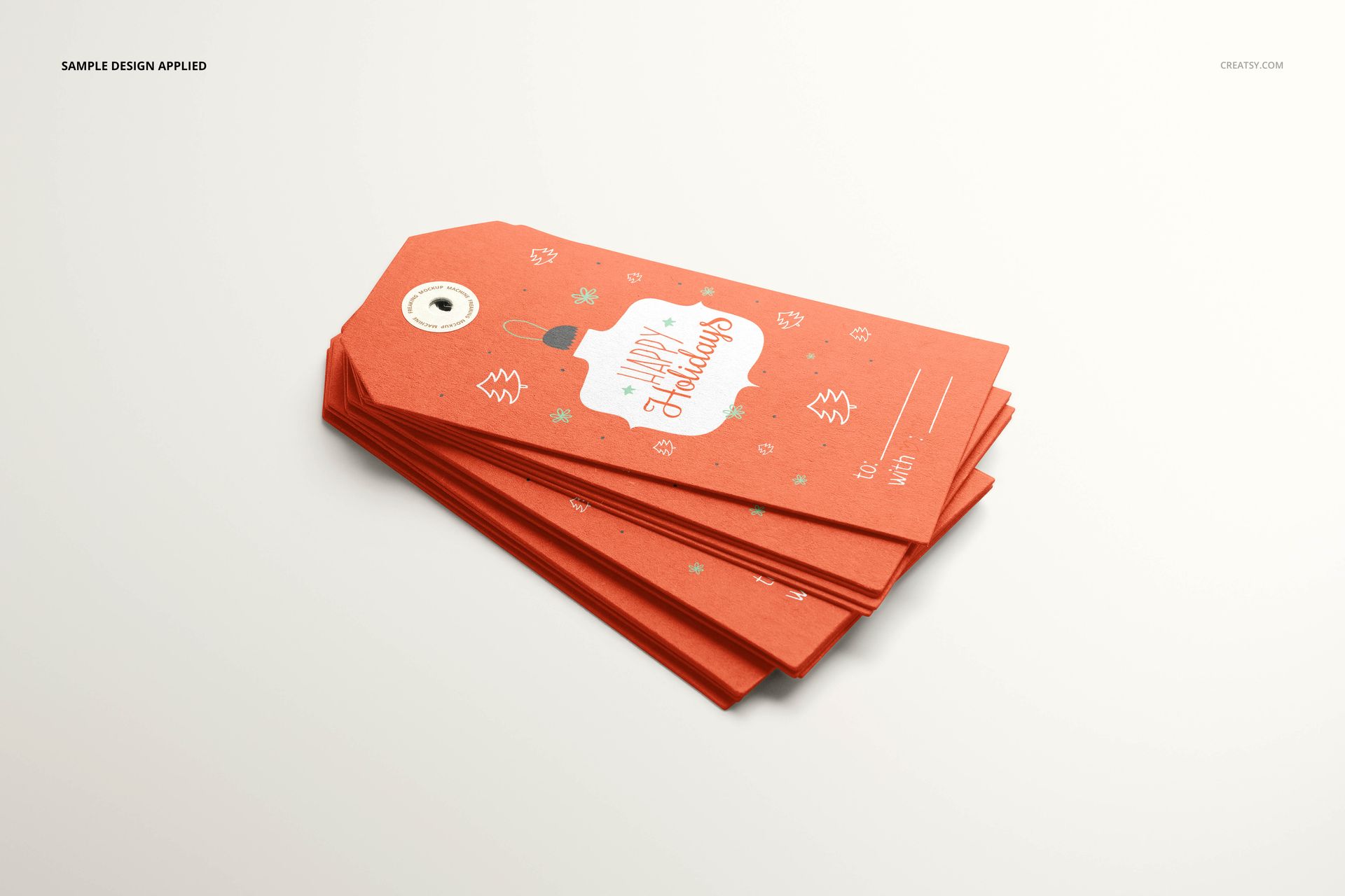 PSD mockup showing several rectangular paper labels in red with white and gold accents, arranged in a neat pile.