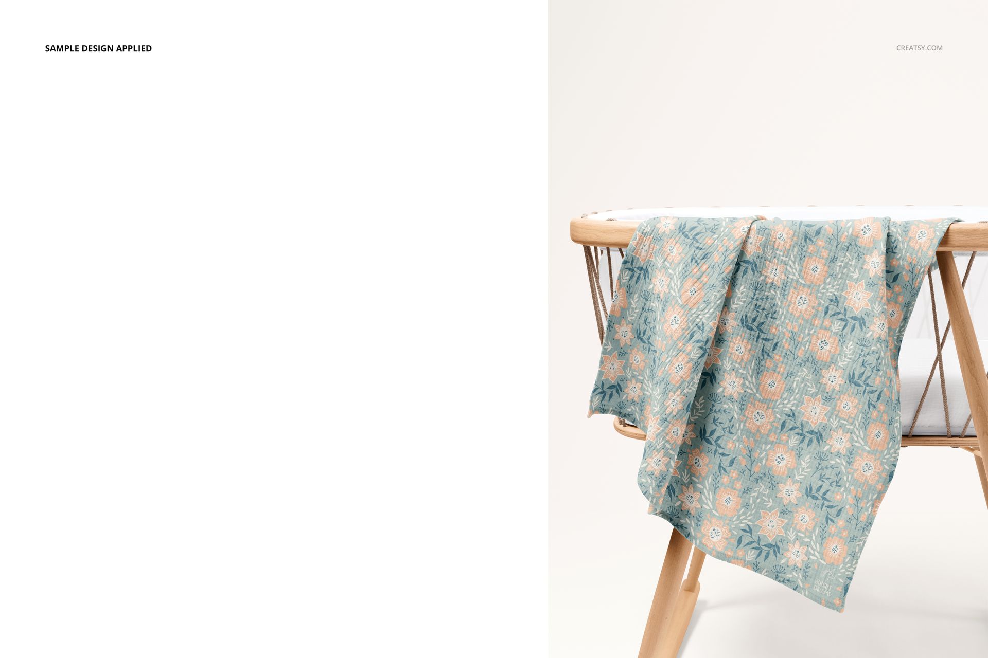 Blue and beige patterned muslin swaddle blanket mockup displayed on a light wooden crib against a neutral background.