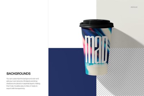 PSD mockup showing a paper coffee cup with a black lid, decorated with colorful abstract graphics and prominent lettering.