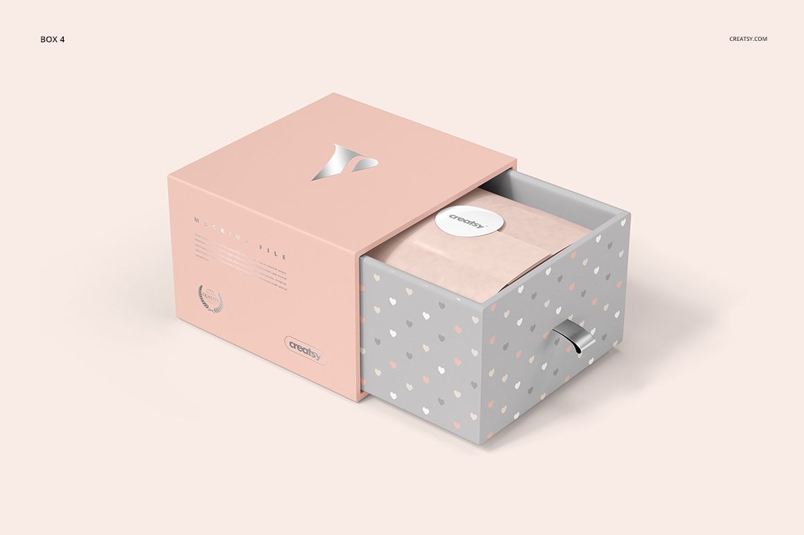 Rectangular packaging box mockup with a pastel pink lid and gray drawer, decorated with small colored dots.