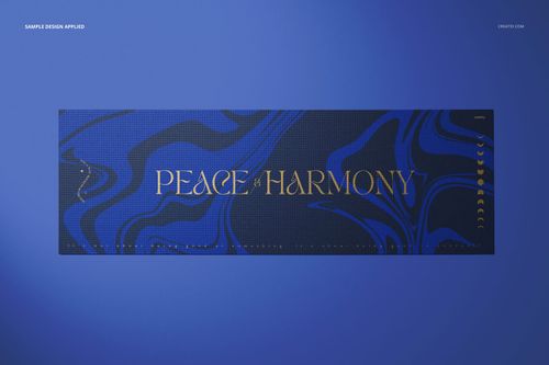 Yoga mat mockup featuring abstract blue swirls and gold lettering, displayed flat against a solid blue background.