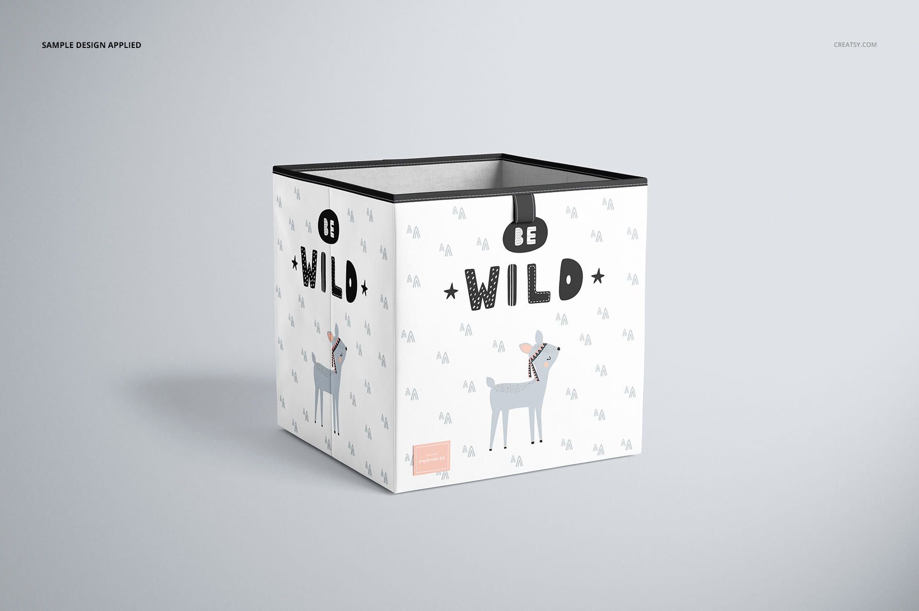 Front view of a folding storage box mockup with a playful animal design and the words 'Be Wild' on a light background.