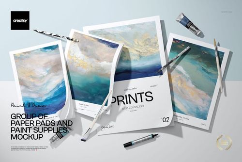 Group of Paper Pads and Paint Supplies Mockup - mockup preview 1