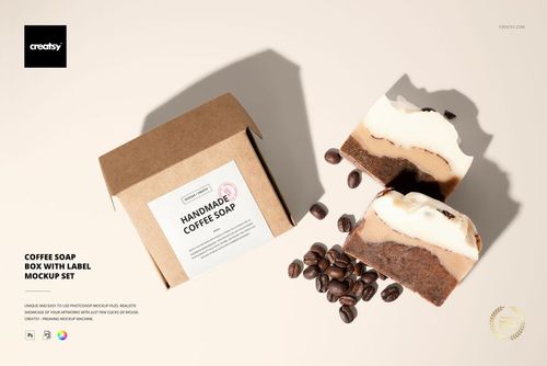 Coffee soap box with a label mockup set on a light surface, shown alongside two coffee soap bars and scattered coffee beans.