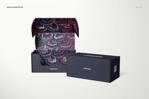 PSD mockup featuring an open and closed mailer box, dark exterior and colorful patterned interior, against a plain backdrop.