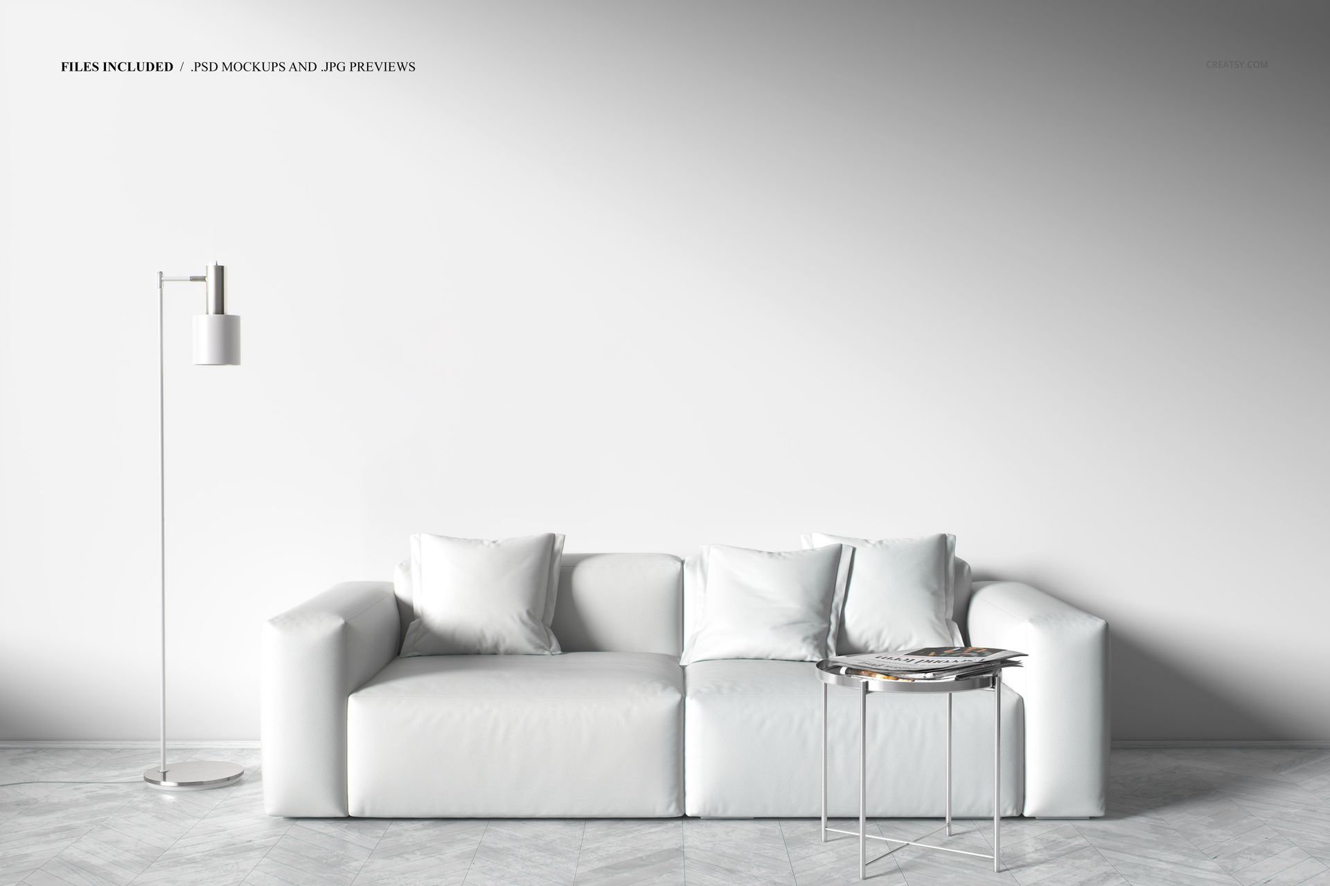 Front view of a modern living room featuring a white leather couch, marble floor, and empty wall for canvas mockup.