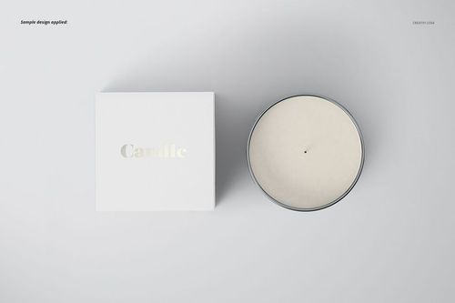 Classic candle mockup featuring a round glass jar and a white box with metallic text, displayed from above.