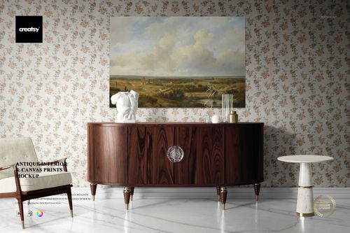 Front view of a canvas print mockup in an antique-style interior, featuring a landscape artwork above a wooden sideboard.