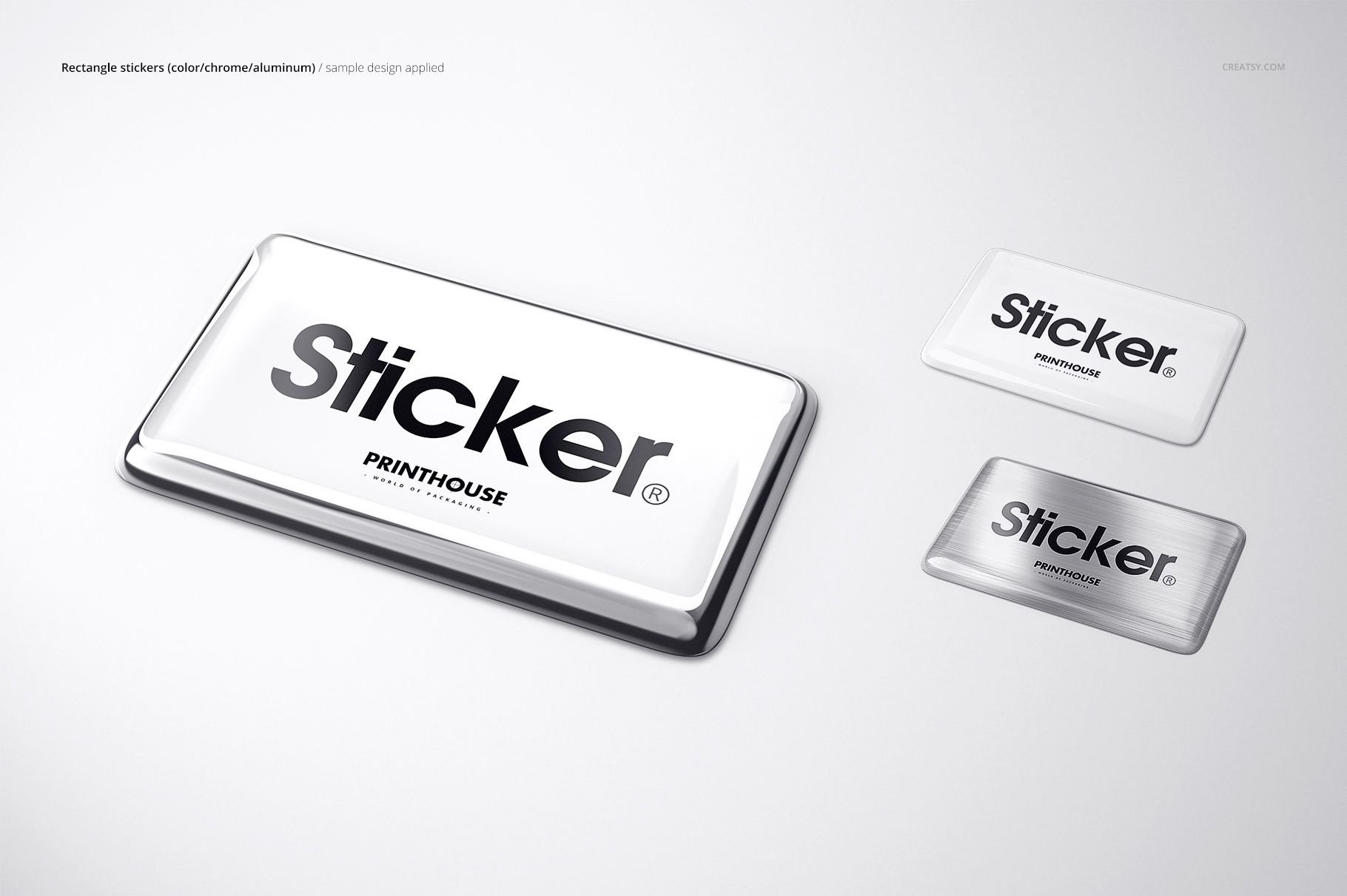 Set of three rectangular epoxy dome stickers with metallic and white finishes arranged on a plain surface, mockup style.
