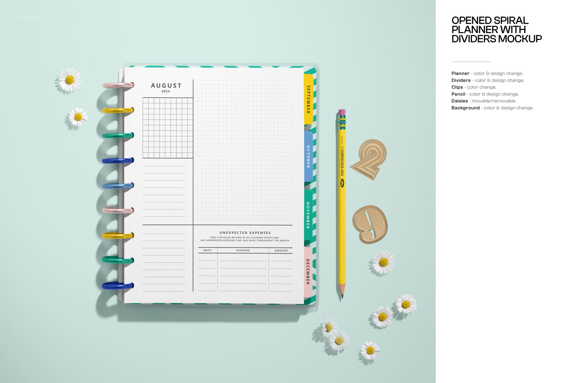 Stationery mockup featuring an open planner, pencil, paper clips, and scattered daisies viewed from above on a blue background.