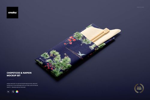 Front view of a chopsticks and napkin set with light wooden chopsticks in a blue patterned napkin mockup on a dark background.
