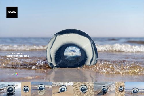 PSD mockup of a colored vinyl record with abstract blue and white pattern displayed on the beach with water and sky visible.