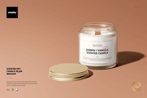 PSD mockup of a scented candle in a transparent jar with a beige lid, displayed on a smooth beige tabletop, label visible.