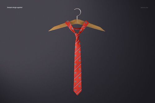 PSD mockup showing a red necktie with repeating motifs, arranged on a hanger with a simple dark background.