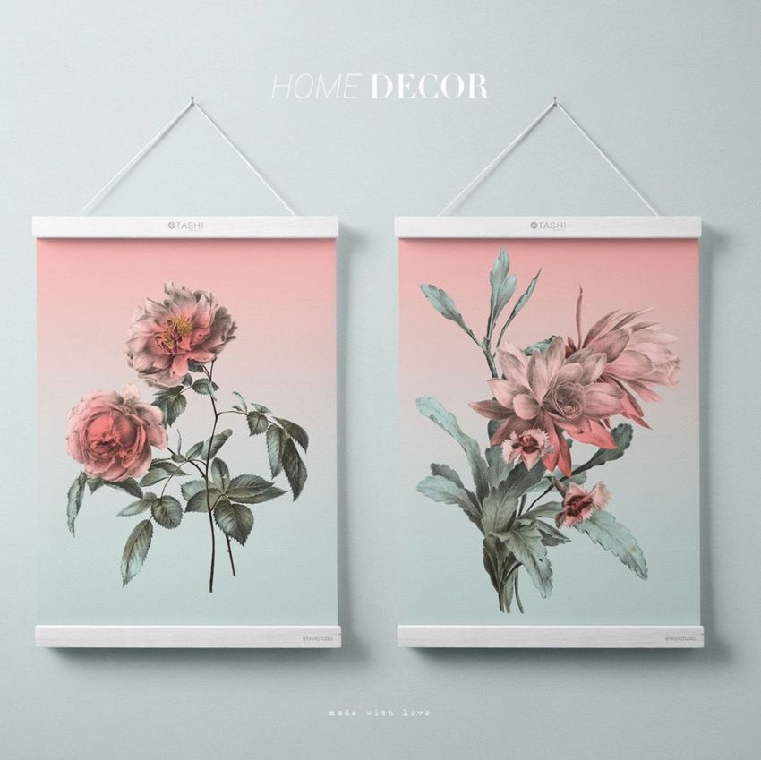Poster mockup featuring two wooden hangers displaying floral prints on a light pastel gradient background wall.