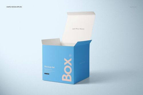 Open matte gift box mockup with blue sides and white lid, displayed from the front on a pale surface.