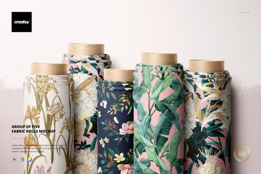 Group of five fabric rolls mockup showing assorted floral and leaf designs, arranged vertically with kraft paper cores.
